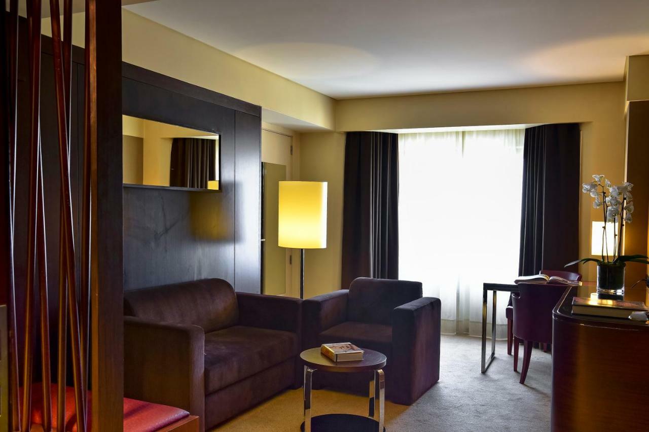 Porto Palacio Hotel By The Editory Bagian luar foto Suite