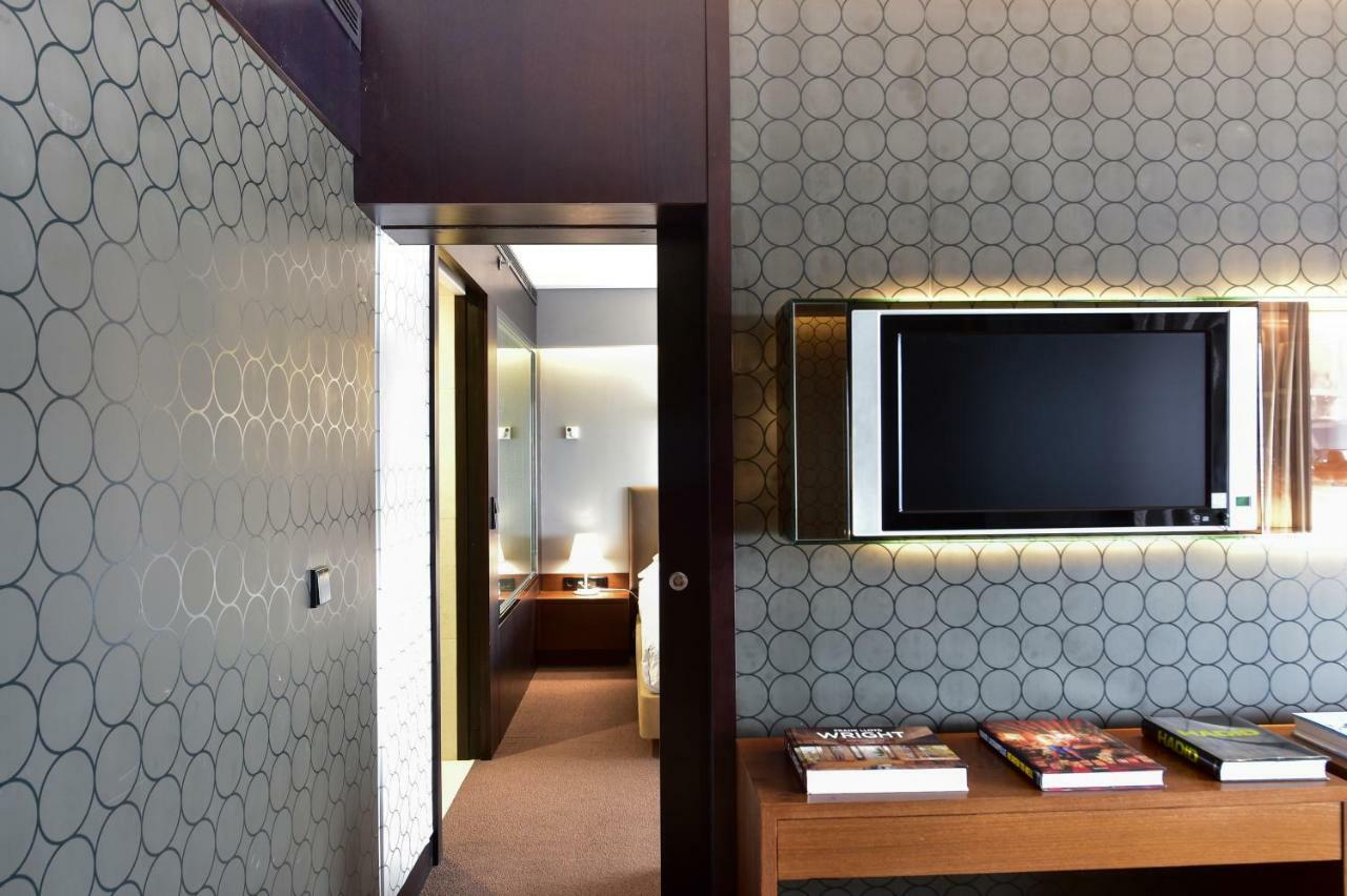 Porto Palacio Hotel By The Editory Bagian luar foto A room at the hotel